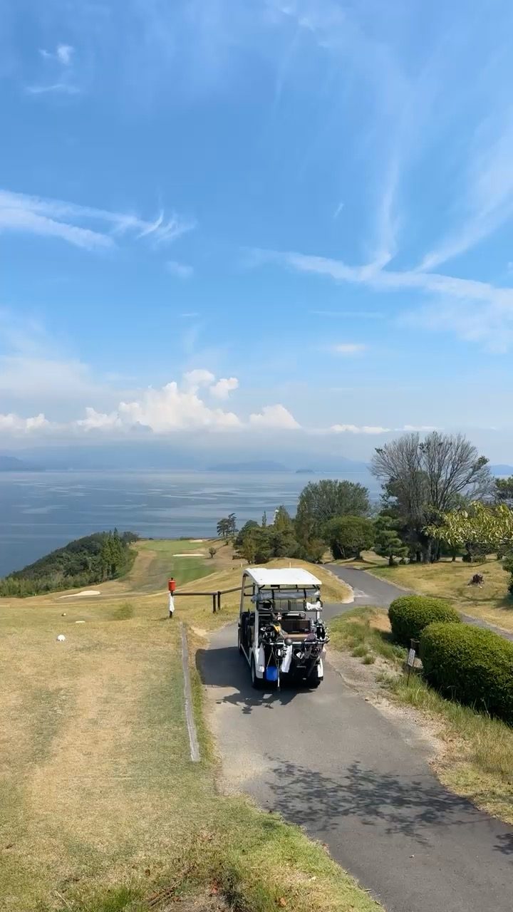 Golf cart on a coastal course overlooking the Seto Inland Sea, Shikoku